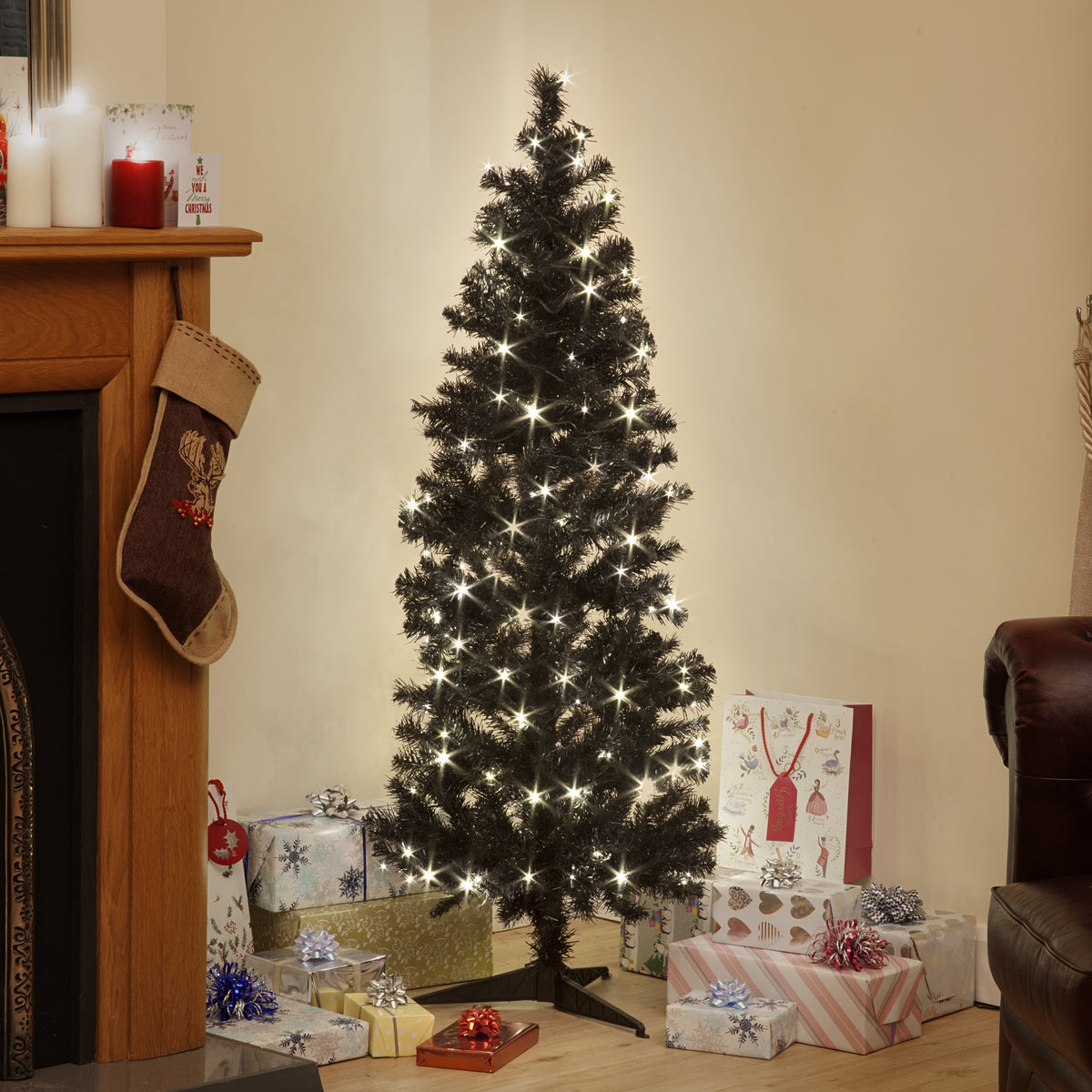 Pre-Lit Deluxe Black Christmas Tree with Warm White LEDs